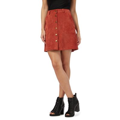 Red button front cord skirt
